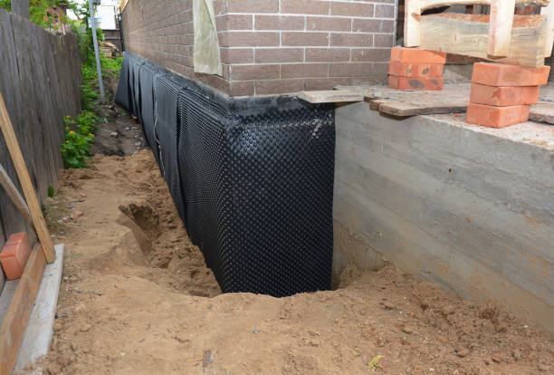 SJ Waterproofing Pros technician performing targeted Sump Pump Installation assessment in Winfield, TN